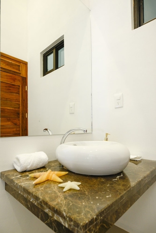 Imagen de la habitación del Hotel Coral Blue Beach Condo. Foto 15