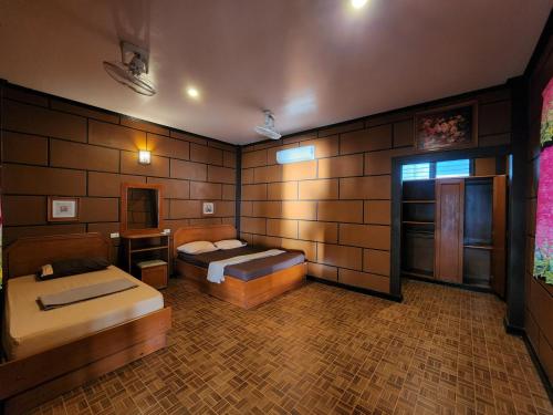 Imagen de la habitación del Hotel Coral Bungalows, Ban Haad Rin. Foto 17