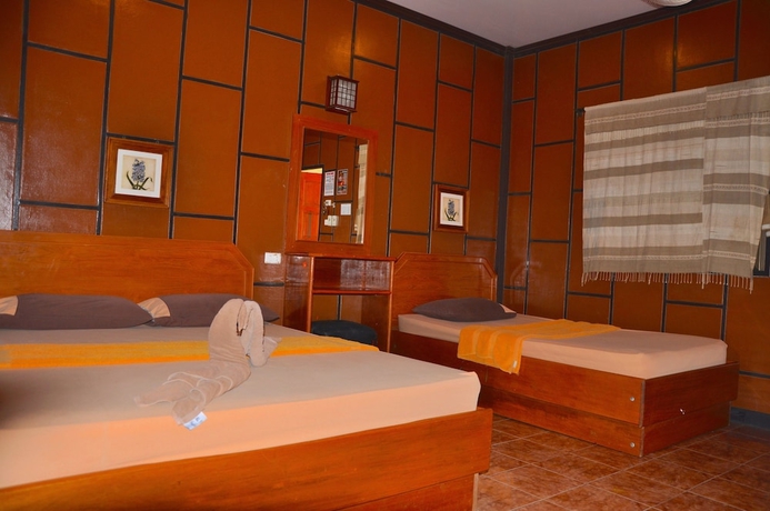 Imagen de la habitación del Hotel Coral Bungalows. Foto 5