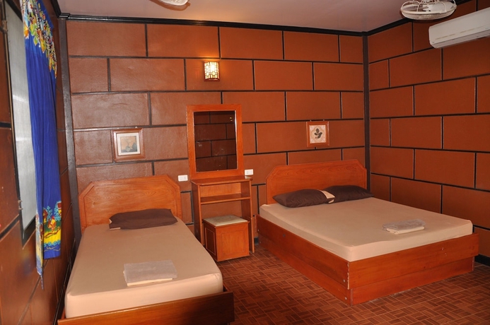 Imagen de la habitación del Hotel Coral Bungalows. Foto 13