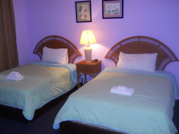 Imagen de la habitación del Hotel Coral Harbour Beach House and Villas. Foto 4