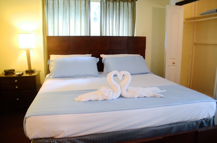 Imagen de la habitación del Hotel Coral Harbour Beach House and Villas. Foto 9