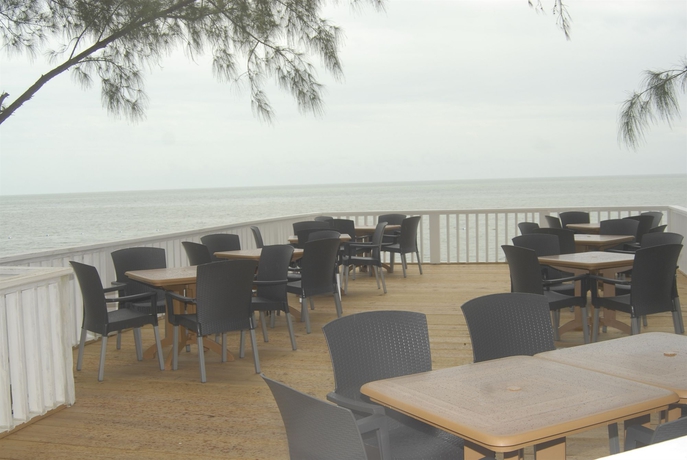 Imagen del bar/restaurante del Hotel Coral Harbour Beach House and Villas. Foto 2