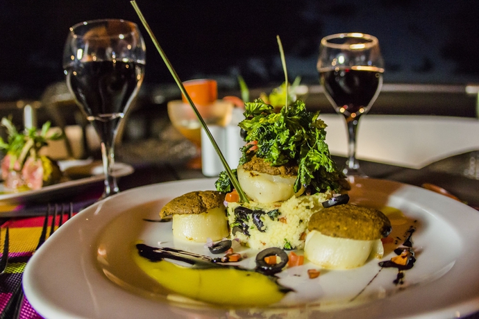 Imagen del bar/restaurante del Hotel Coral Princess and Dive Resort. Foto 2