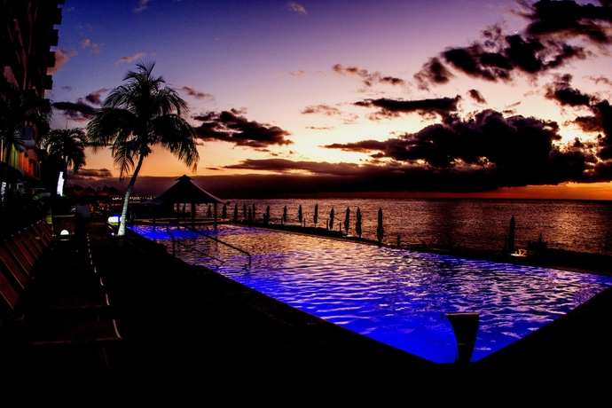 Imagen de la piscina del Hotel Coral Princess and Dive Resort. Foto 16