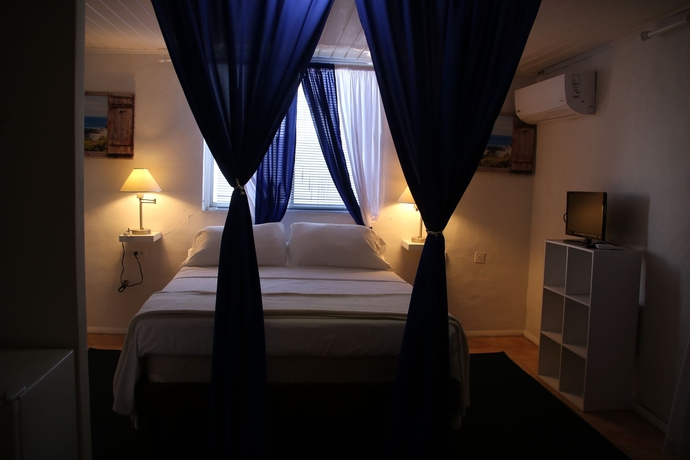 Imagen de la habitación del Hotel Coral Reef Beach Aruba. Foto 15