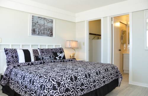 Imagen de la habitación del Hotel Coral Tides Resort & Beach Club. Foto 9