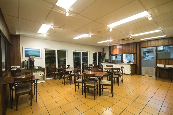 Imagen del bar/restaurante del Hotel Coral Tree Inn. Foto 6