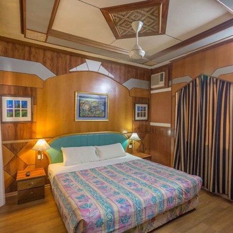 Imagen de la habitación del Hotel Coral View Island Resort. Foto 7