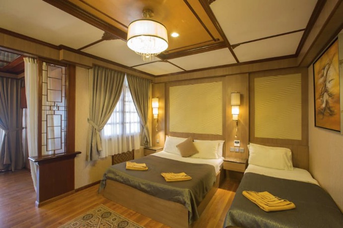 Imagen de la habitación del Hotel Coral View Island Resort. Foto 10