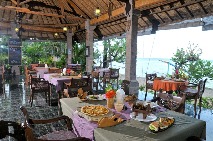 Imagen del bar/restaurante del Hotel Coral View Villas. Foto 2