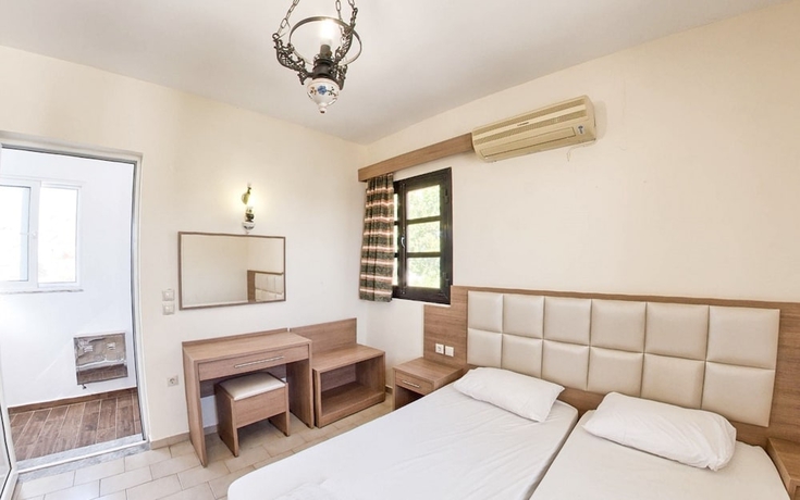 Imagen de la habitación del Hotel Coralli Apartments. Foto 9