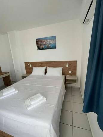 Imagen de la habitación del Hotel Coralli Beach. Foto 20