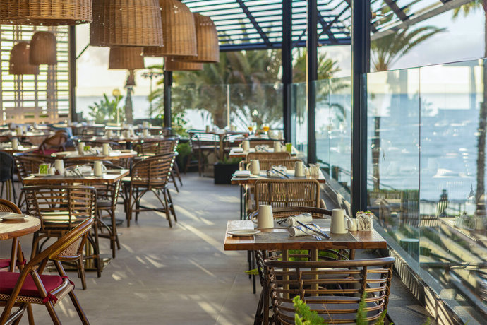 Imagen del bar/restaurante del Hotel Corallium Dunamar By Lopesan Hotels - Adults Only. Foto 6