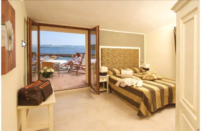 Imagen de la habitación del Hotel Corallo, Isola Rossa. Foto 13