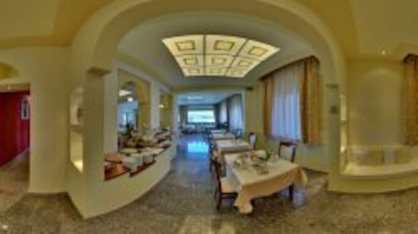 Imagen del bar/restaurante del Hotel Corallo, Isola Rossa. Foto 2