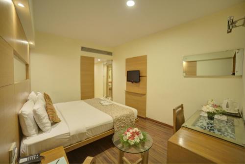 Imagen de la habitación del Hotel Coraltree By Goldfinch Hotels Bangalore. Foto 6