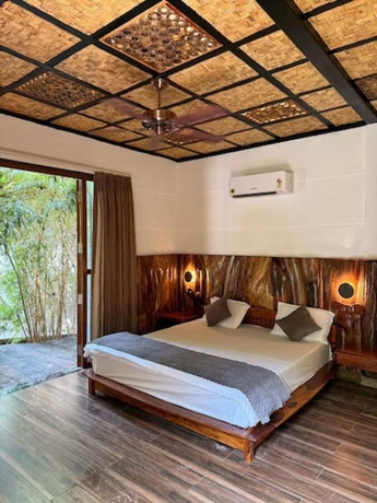 Imagen de la habitación del Hotel Corbett Cabana Farm. Foto 4