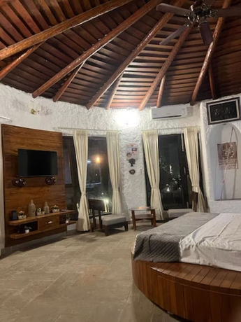 Imagen de la habitación del Hotel Corbett Cabana Farm. Foto 7
