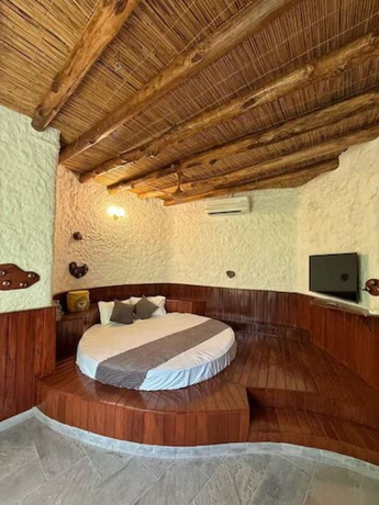 Imagen de la habitación del Hotel Corbett Cabana Farm. Foto 8