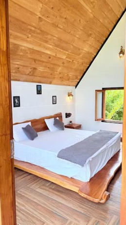 Imagen de la habitación del Hotel Corbett Cabana Farm. Foto 13