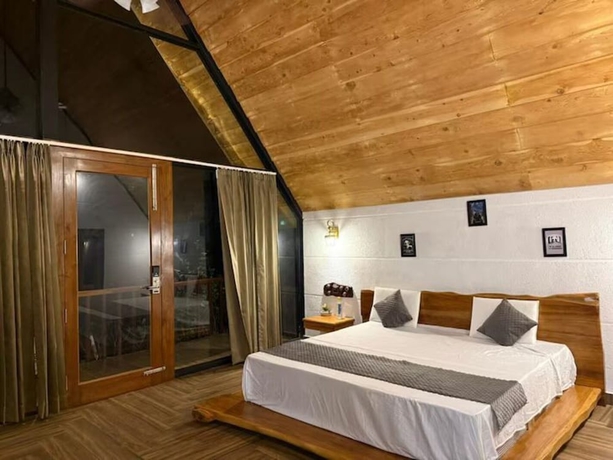 Imagen de la habitación del Hotel Corbett Cabana Farm. Foto 16