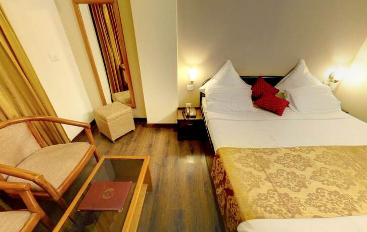 Imagen de la habitación del Hotel Corbett Kingdom. Foto 18