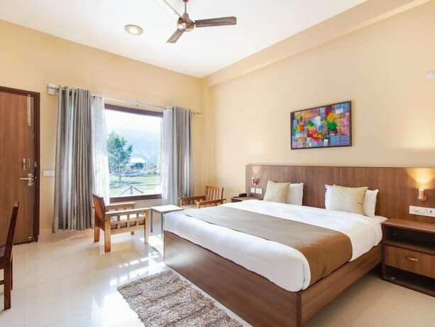 Imagen de la habitación del Hotel Corbett River Valley Resort. Foto 20