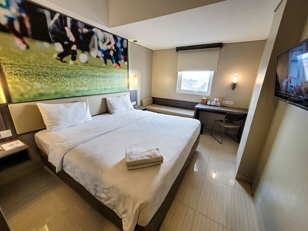 Imagen de la habitación del Hotel Cordela Kartika Dewi Jogjakarta. Foto 23