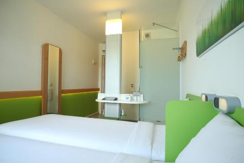 Imagen de la habitación del Hotel Cordia Hotel Surabaya Airport. Foto 17