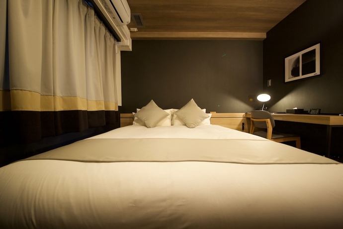 Imagen de la habitación del Hotel Cordia Osaka. Foto 11