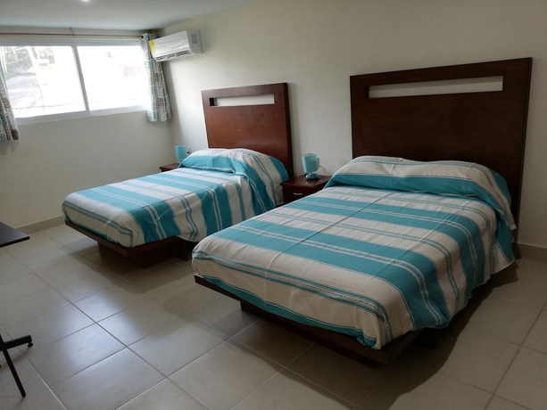 Imagen de la habitación del Hotel Cordiality Inn. Foto 1