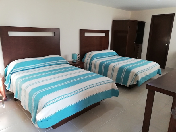 Imagen de la habitación del Hotel Cordiality Inn. Foto 2
