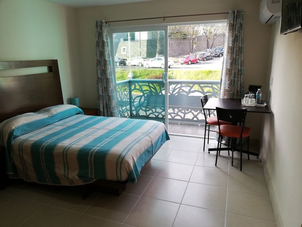 Imagen de la habitación del Hotel Cordiality Inn. Foto 3