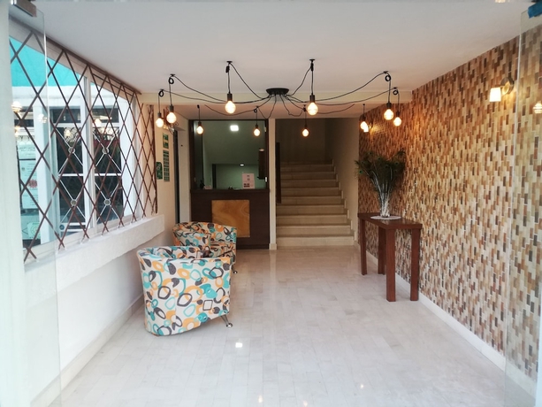 Imagen de los interiores del Hotel Cordiality Inn. Foto 15