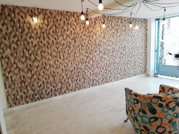 Imagen de los interiores del Hotel Cordiality Inn. Foto 16