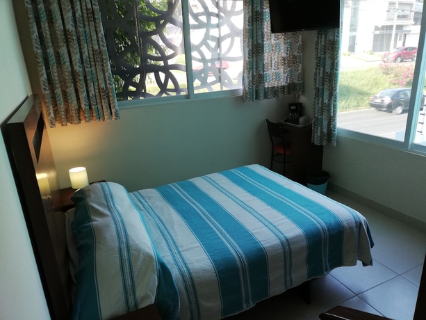 Imagen de la habitación del Hotel Cordiality Inn. Foto 11