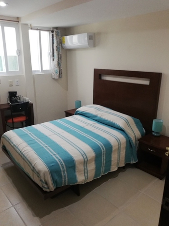 Imagen de la habitación del Hotel Cordiality Inn. Foto 13