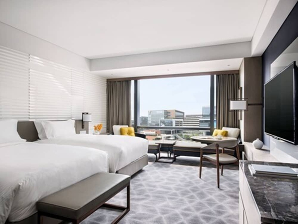 Imagen de la habitación del Hotel Cordis Shanghai Hongqiao. Foto 6