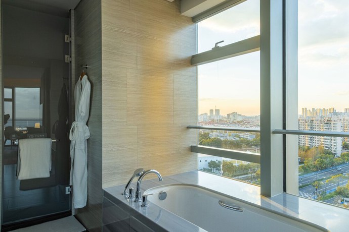 Imagen de la habitación del Hotel Cordis Shanghai Seaworld. Foto 6