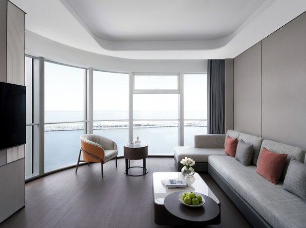 Imagen de la habitación del Hotel Cordis Shanghai Seaworld. Foto 13