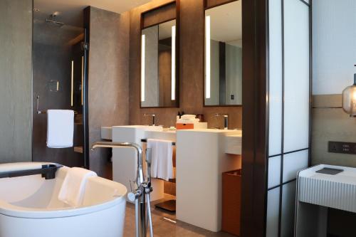 Imagen de la habitación del Hotel Cordis, Xuzhou, Yunlong District. Foto 17