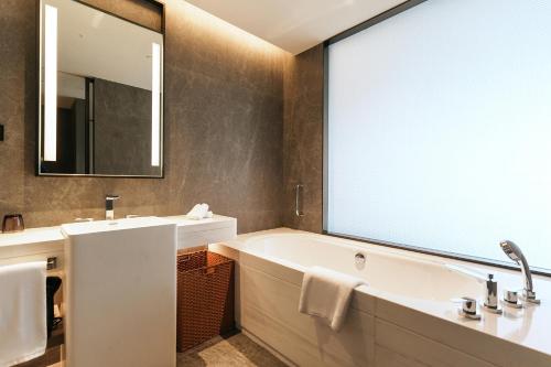 Imagen de la habitación del Hotel Cordis, Xuzhou, Yunlong District. Foto 19