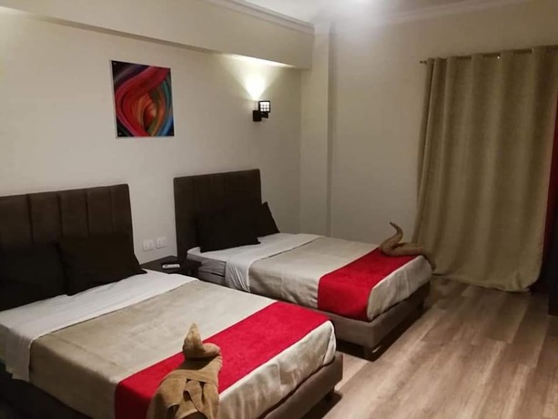 Imagen de la habitación del Hotel Cordoba Suits. Foto 14