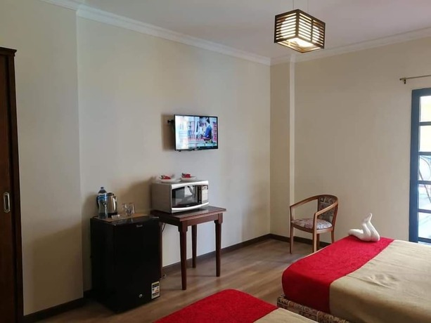 Imagen de la habitación del Hotel Cordoba Suits. Foto 18