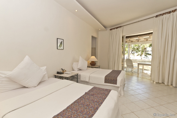 Imagen de la habitación del Hotel Cordova Reef Village Resort. Foto 3