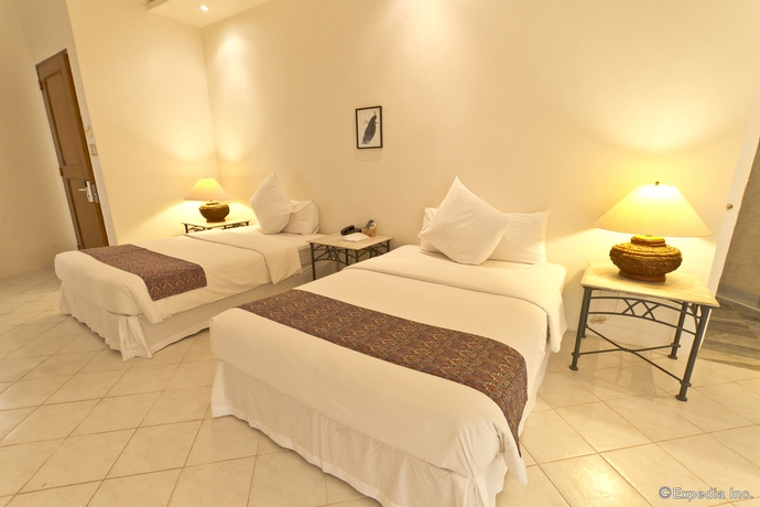 Imagen de la habitación del Hotel Cordova Reef Village Resort. Foto 9