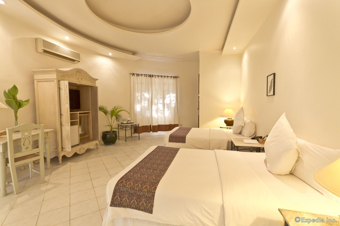 Imagen de la habitación del Hotel Cordova Reef Village Resort. Foto 10