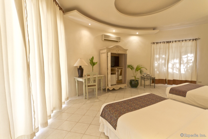 Imagen de la habitación del Hotel Cordova Reef Village Resort. Foto 11