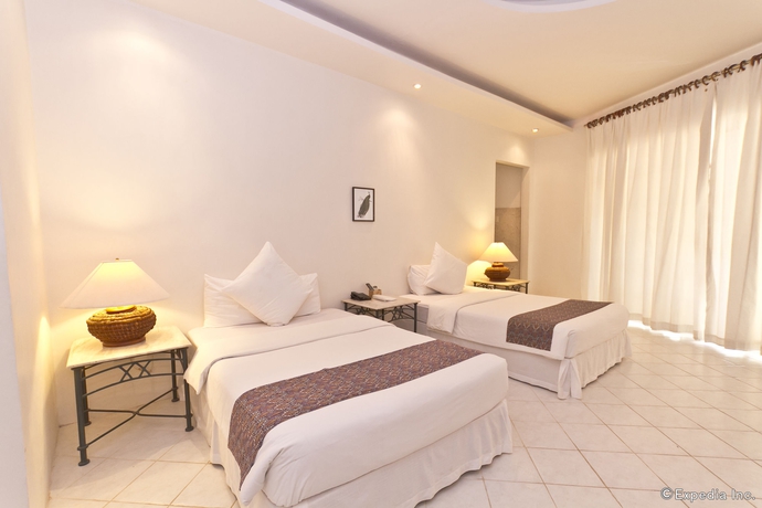 Imagen de la habitación del Hotel Cordova Reef Village Resort. Foto 12